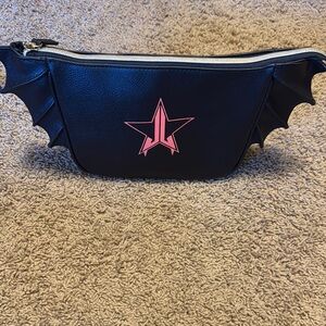 Jeffree Star Black and Orange Star Bat Wing Makeup Bag